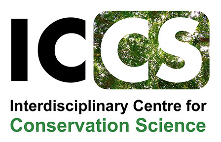 The ICCS logo with forest background